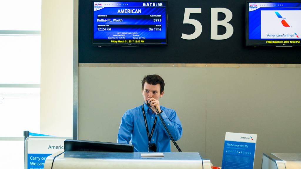 Lead Agent Skyler Reynolds announces the boarding call at MAF. IMG_MAF_Skyler_Reynolds_AirportAgent-3