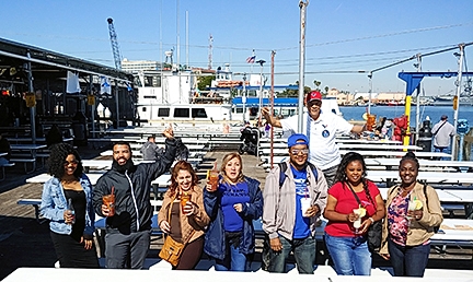 IAH employees celebrate a dine lunch at San Pedro Fish Market. 