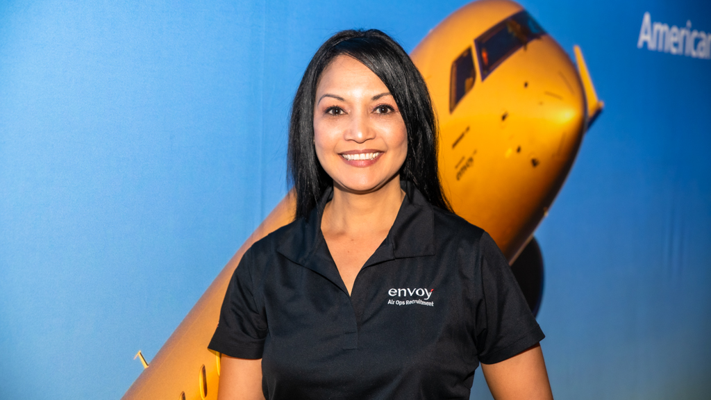 Envoy Flight Attendant and AirOps Recruiter Nancy Ortiz at the 2023 PAPA Expo.