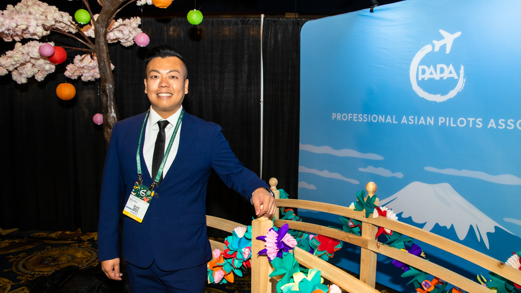 Envoy First Officer Brenden Kung, 32, at the 2023 PAPA Expo.