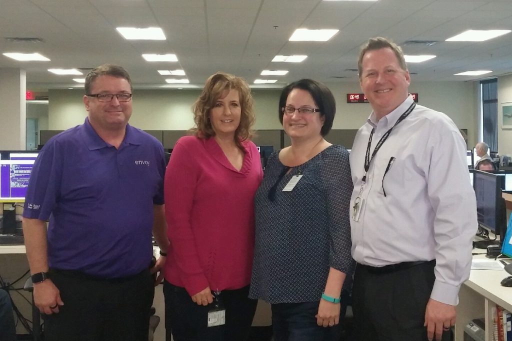 Kristi Shoates receiving her Envoy President's Award in 2015. Pictured from left to right: John Dixon, VP of Crew Services; Jane Eastin, Director of Crew Scheduling; Kristi Shoates; and Ric Wilson, VP of Flight Operations. 